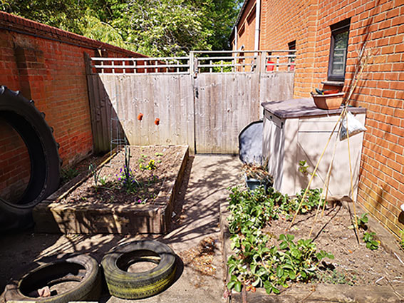 Raised planting beds and outdoor discovery space at Mulbarton nursery